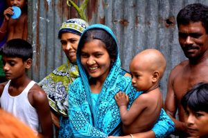 Young mother holding baby